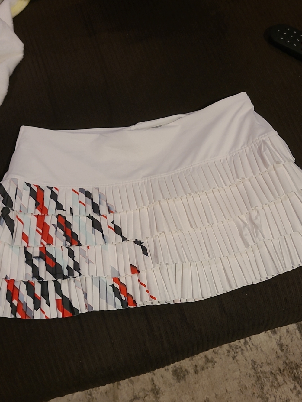 Lucky in Love White Pleated Mini Skirt with Red & Black Geometric Trim